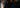 Photorealistic editorial portrait of Rebel Mythic standing in a rain-soaked downtown street at night