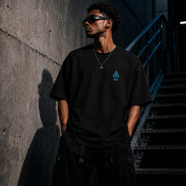 Zane Mode Tee showing oversized fit, 240 GSM heavyweight cotton, 100 percent cotton construction, Pantone Black C color